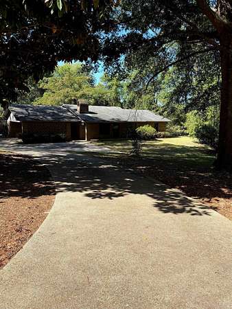 7.67 Acres of Land with Home for Sale in El Dorado, Arkansas
