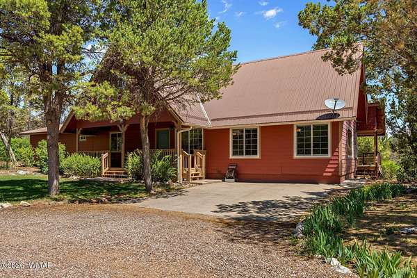 1.89 Acres of Land with Home for Sale in Overgaard, Arizona