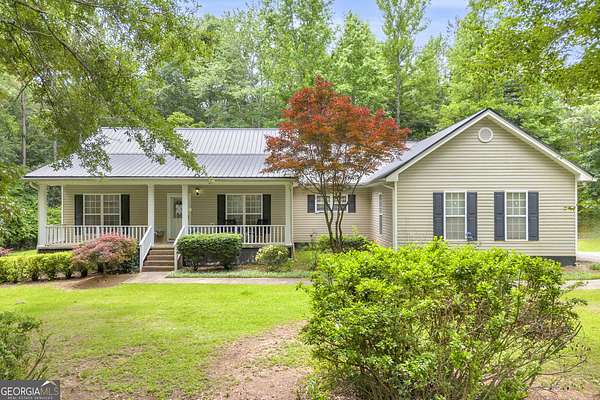 1.5 Acres of Land with Home for Sale in Commerce, Georgia