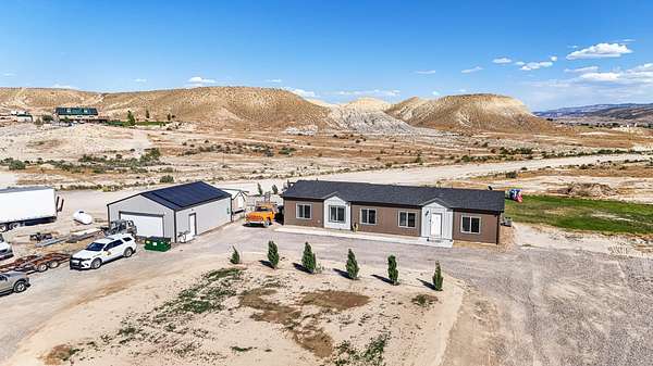 21.7 Acres of Recreational Land with Home for Sale in Mack, Colorado