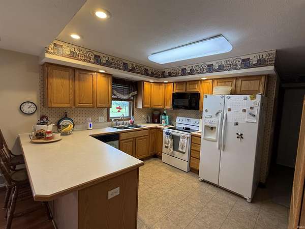 9.87 Acres of Land with Home for Sale in Kendallville, Indiana