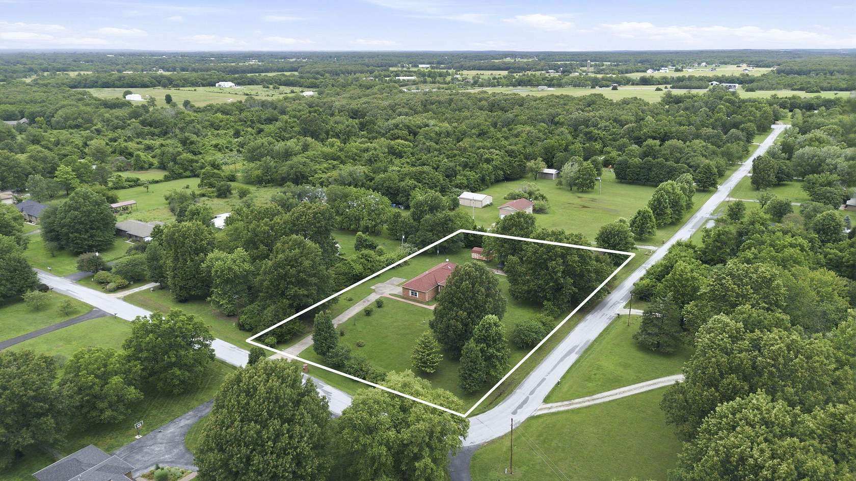1.86 Acres of Land with Home for Sale in Fair Grove, Missouri