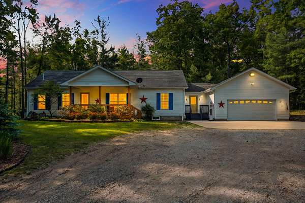 1.79 Acres of Land with Home for Sale in Lewiston, Michigan