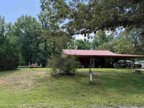 13.5 Acres of Land with Home for Sale in Haleyville, Alabama