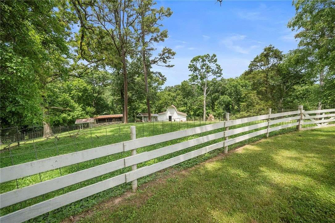 15 Acres of Land with Home for Sale in Rogers, Arkansas