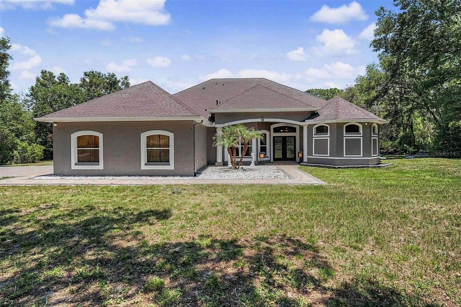 2.39 Acres of Land with Home for Sale in Hudson, Florida