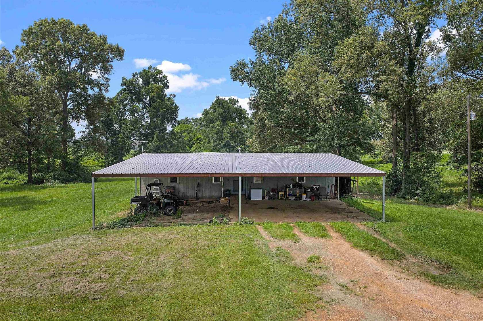 10 Acres of Land with Home for Sale in Center, Texas