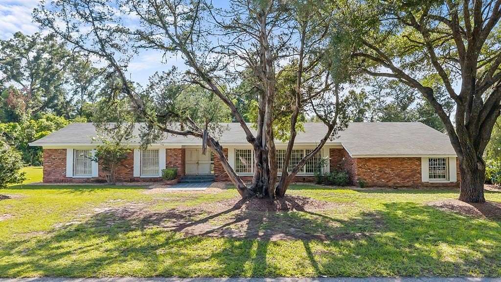 1.55 Acres of Land with Home for Sale in Chiefland, Florida
