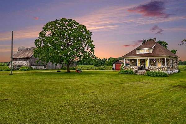 2 Acres of Land with Home for Sale in Ellsworth, Michigan