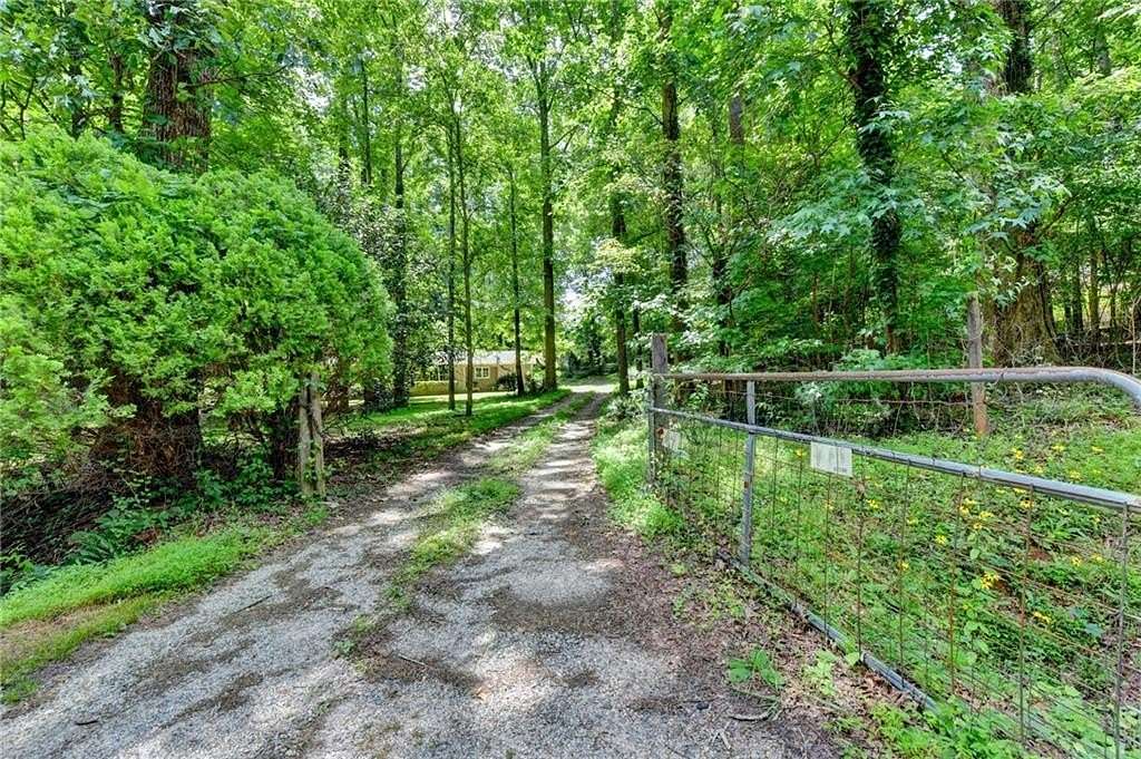 1.5 Acres of Land with Home for Sale in Cumming, Georgia