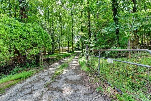 1.5 Acres of Land with Home for Sale in Cumming, Georgia