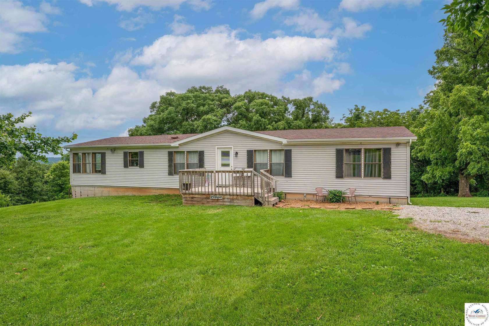 12.4 Acres of Land with Home for Sale in Sedalia, Missouri