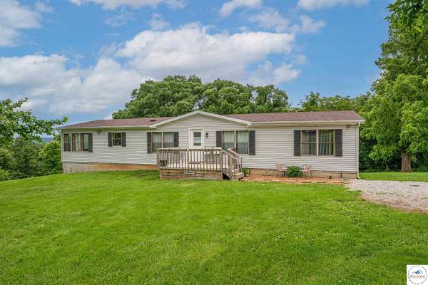 12.4 Acres of Land with Home for Sale in Sedalia, Missouri