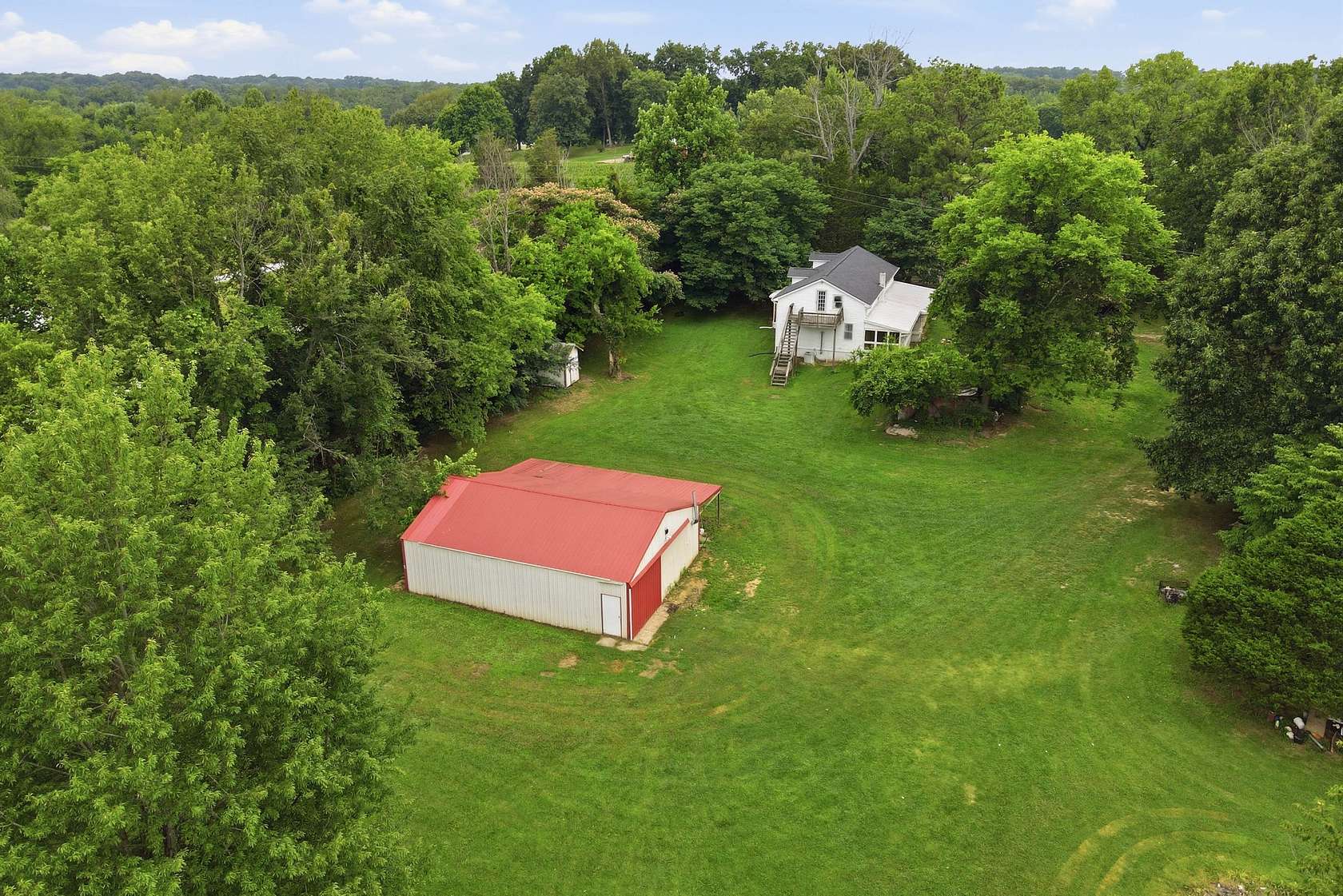 1.6 Acres of Land with Home for Sale in Cottontown, Tennessee