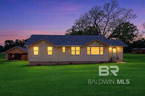 1.5 Acres of Land with Home for Sale in Eight Mile, Alabama