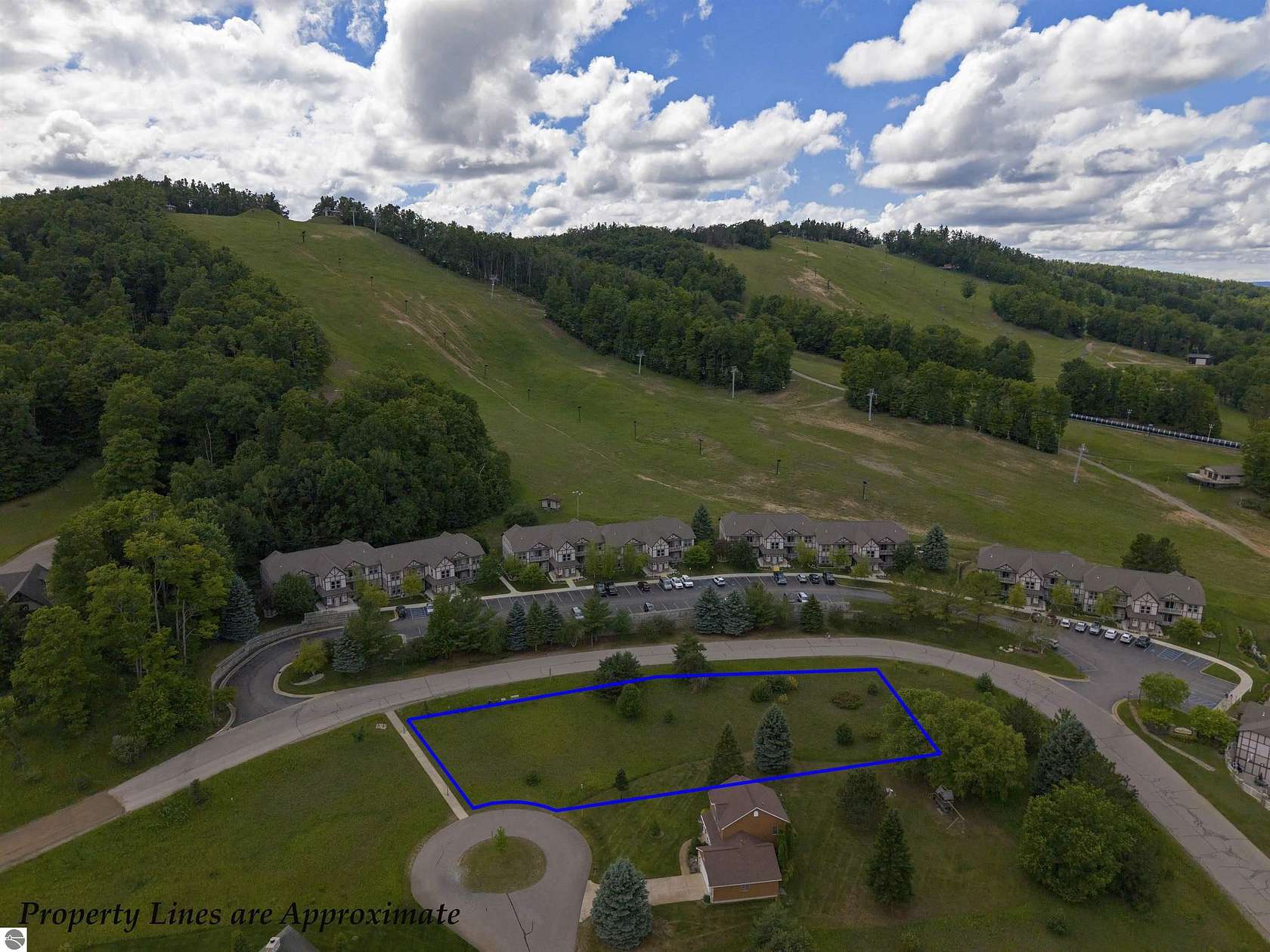0.7 Acres of Residential Land for Sale in Boyne Falls, Michigan