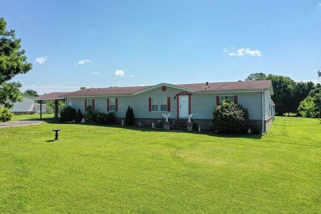 1.8 Acres of Land with Home for Sale in Milan, Tennessee
