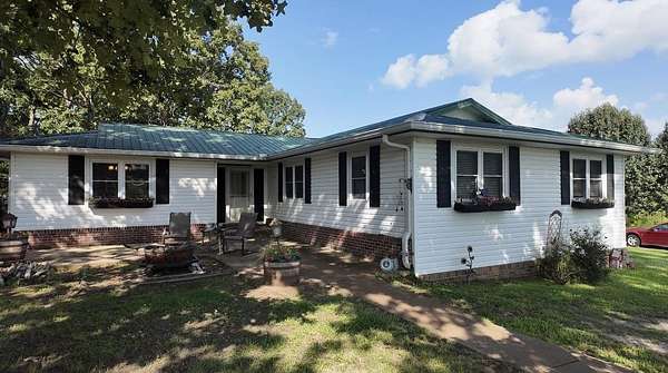 3.34 Acres of Land with Home for Sale in Michie, Tennessee