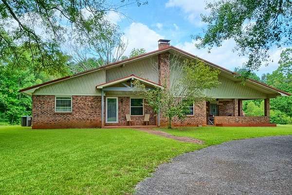 4.56 Acres of Land with Home for Sale in San Augustine, Texas