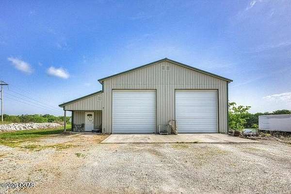 4.43 Acres of Improved Commercial Land for Sale in Neosho, Missouri