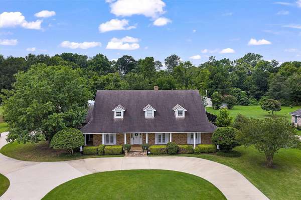 1.5 Acres of Land with Home for Sale in Bossier City, Louisiana