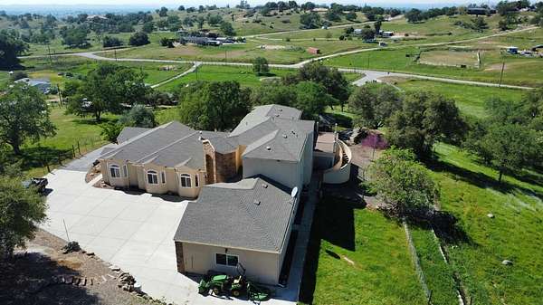 2.5 Acres of Land with Home for Sale in Raymond, California