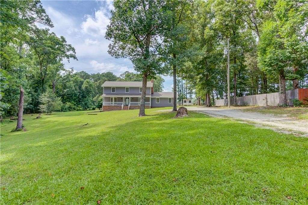 1.5 Acres of Land with Home for Sale in Loganville, Georgia