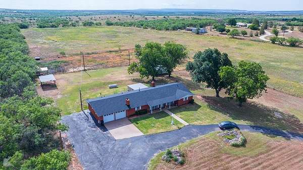 26.9 Acres of Land with Home for Sale in Sweetwater, Texas