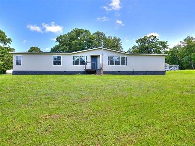 5 Acres of Land with Home for Sale in Mounds, Oklahoma