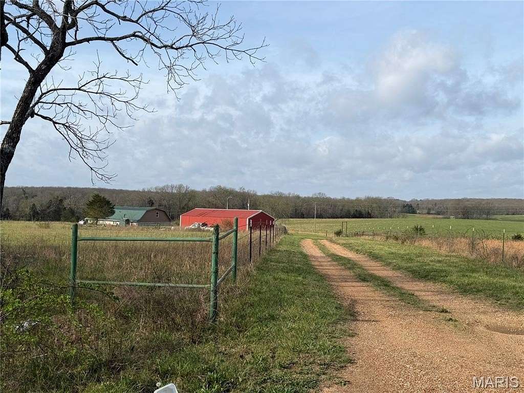 13.2 Acres of Land with Home for Sale in Sherrill Township, Missouri