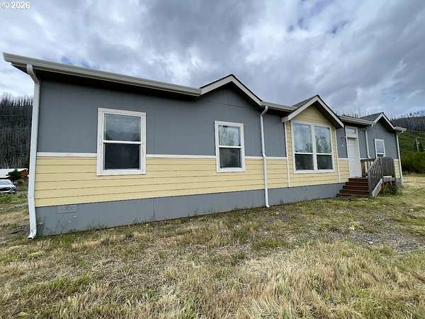 2.5 Acres of Land with Home for Sale in Blue River, Oregon