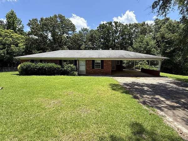 6.4 Acres of Land with Home for Sale in Louisville, Mississippi