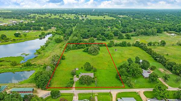 5.62 Acres of Land with Home for Sale in Blossom, Texas