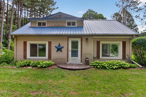 13.3 Acres of Land with Home for Sale in Rives Junction, Michigan