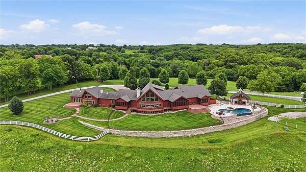 125 Acres of Agricultural Land with Home for Sale in Edgerton, Missouri
