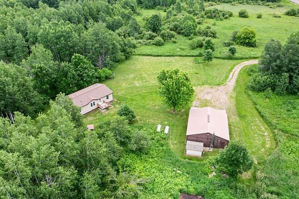 20.5 Acres of Agricultural Land with Home for Sale in Milaca, Minnesota