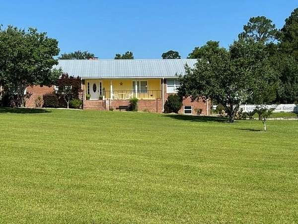 9.42 Acres of Land with Home for Sale in Abbeville, Georgia
