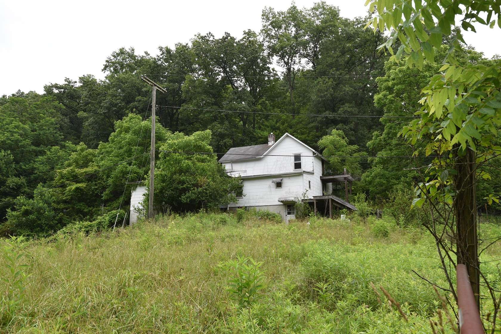 6.1 Acres of Land with Home for Sale in Logan, Ohio