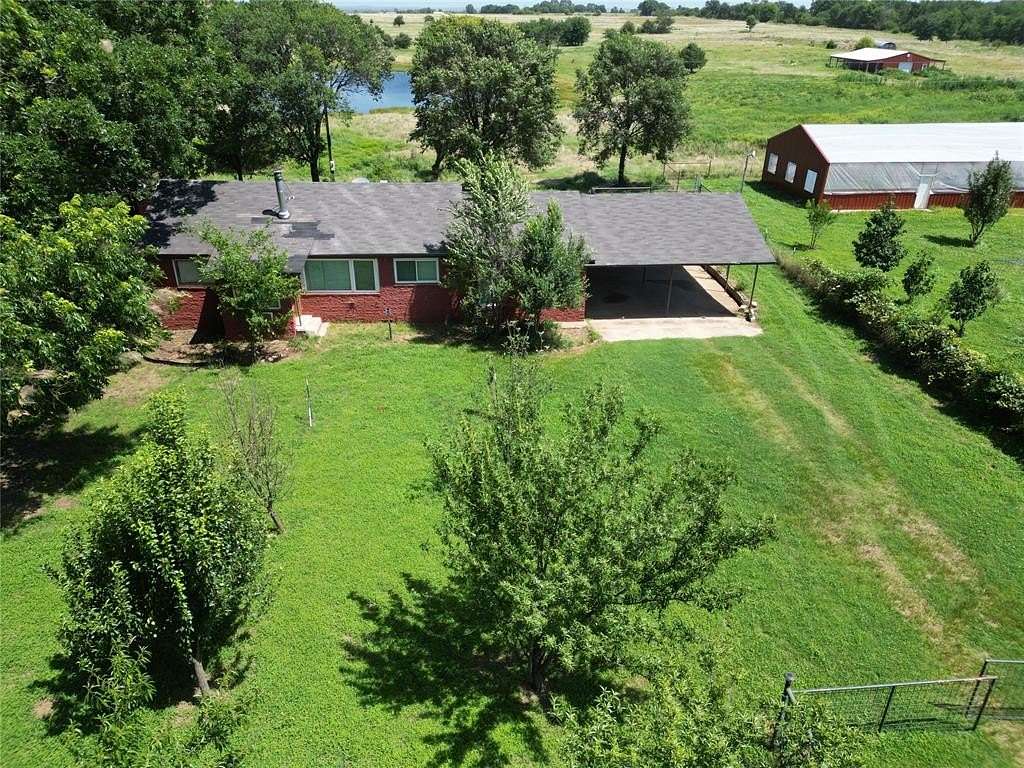 40 Acres of Agricultural Land with Home for Sale in Holdenville, Oklahoma