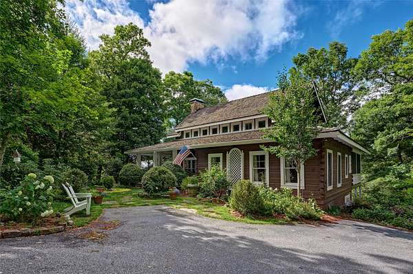 1.76 Acres of Land with Home for Sale in Cashiers, North Carolina