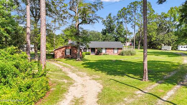 26.7 Acres of Agricultural Land with Home for Sale in Jesup, Georgia