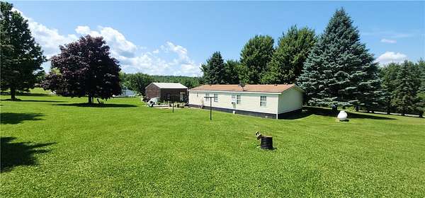1.8 Acres of Land with Home for Sale in Newfield, New York