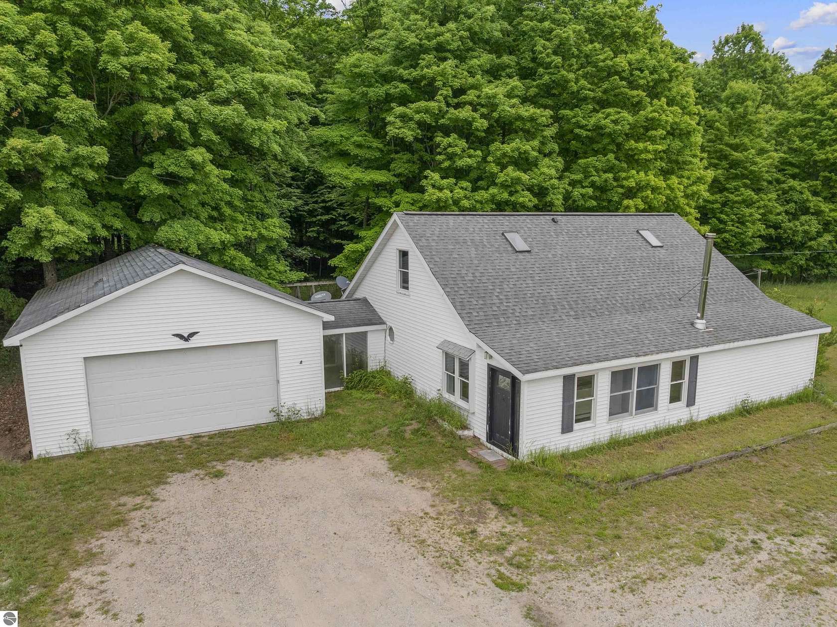 5 Acres of Land with Home for Sale in Beulah, Michigan