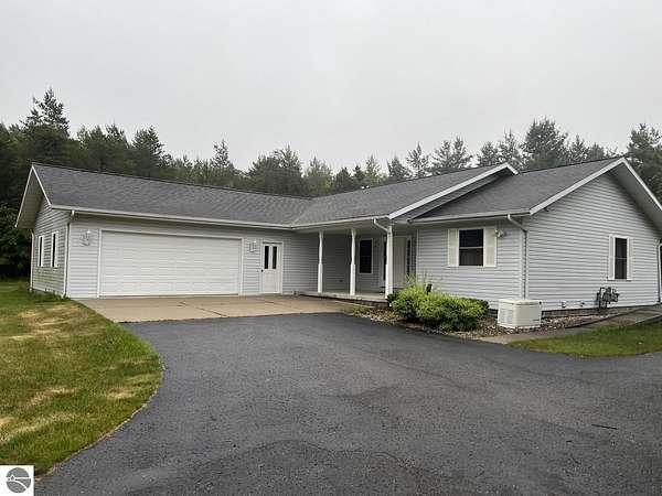 1.5 Acres of Land with Home for Sale in Roscommon, Michigan