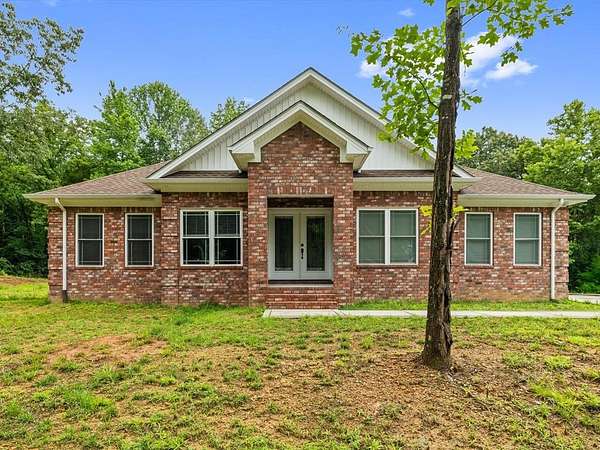 3.54 Acres of Land with Home for Sale in Hanson, Kentucky