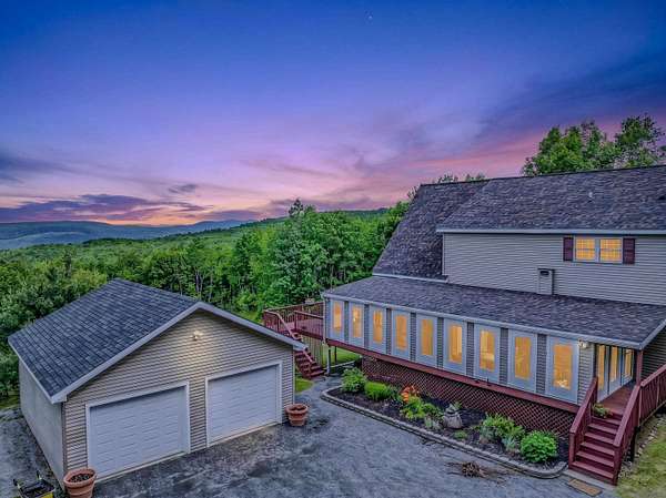 5.3 Acres of Land with Home for Sale in Littleton, New Hampshire
