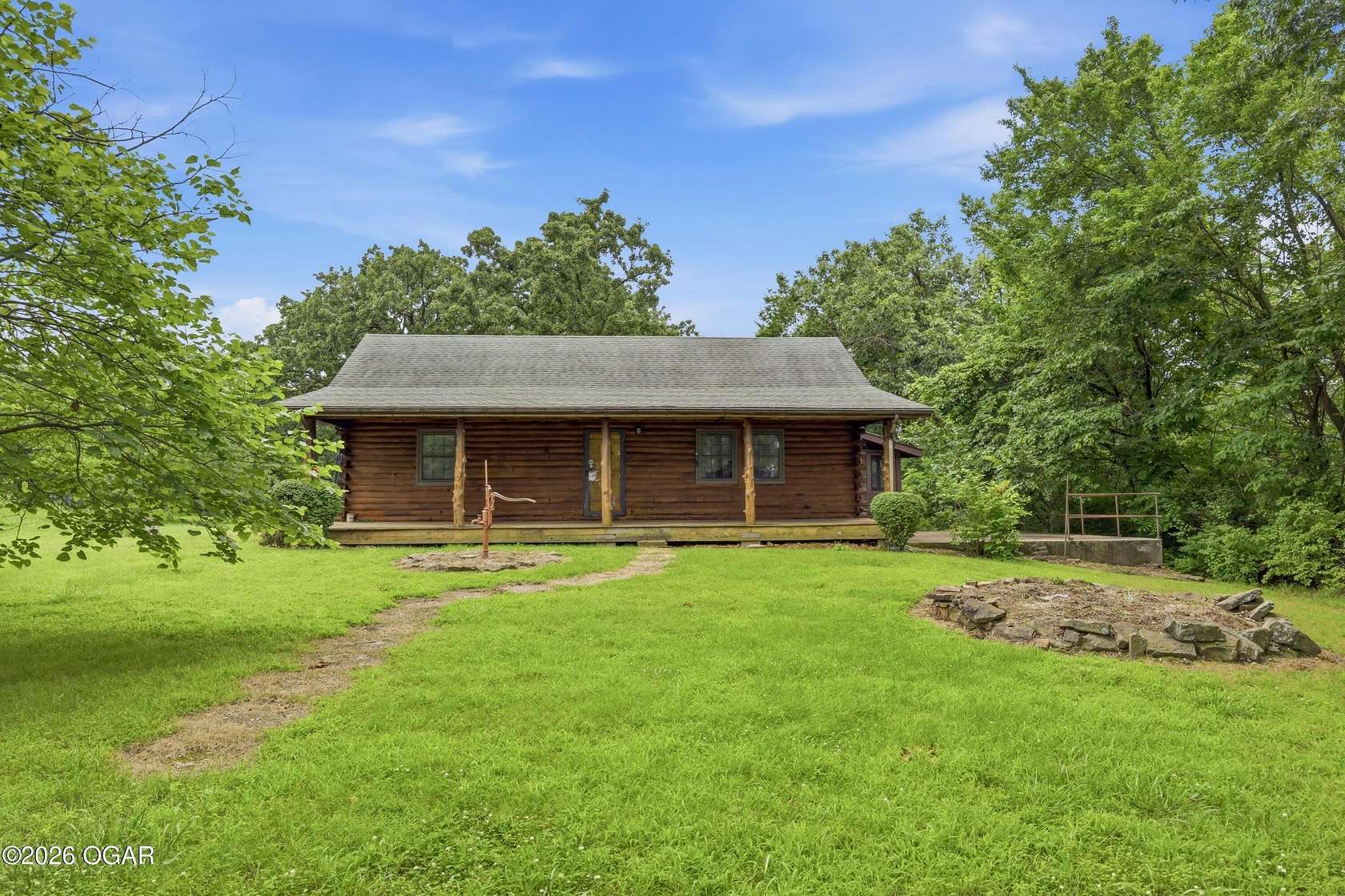74.2 Acres of Land with Home for Sale in Neosho, Missouri