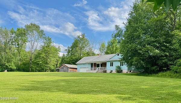 14.2 Acres of Land with Home for Sale in Pleasant Mount, Pennsylvania