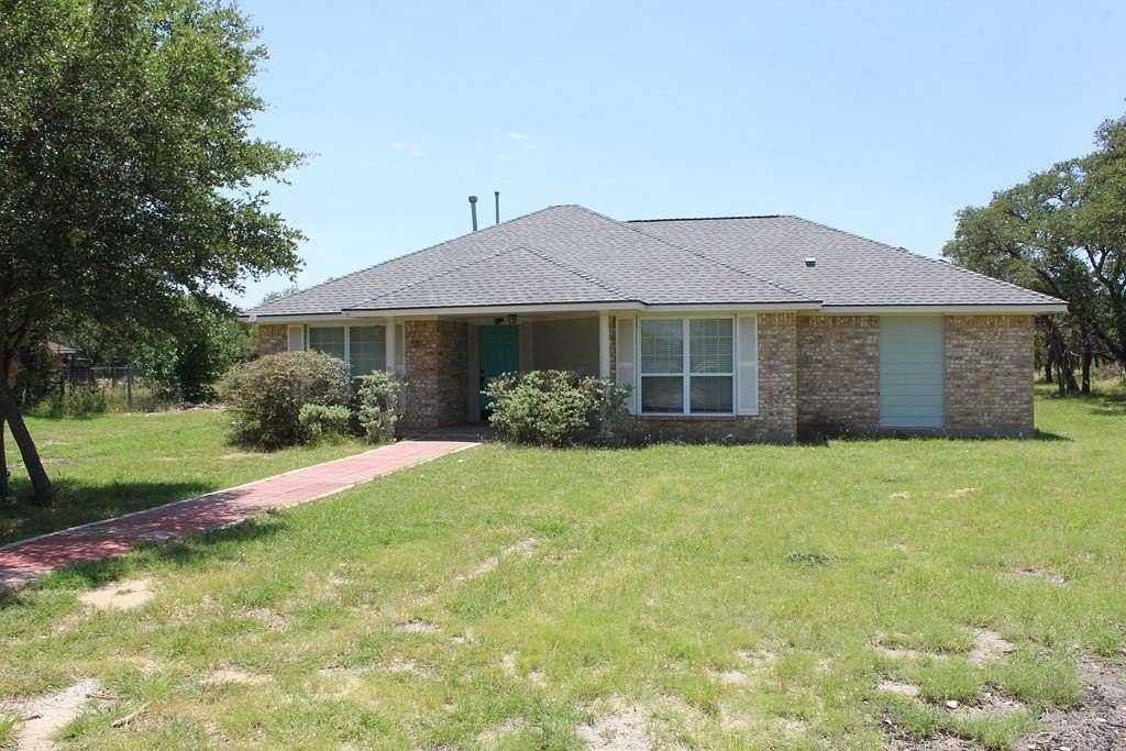 7 Acres of Land with Home for Sale in Mountain Home, Texas
