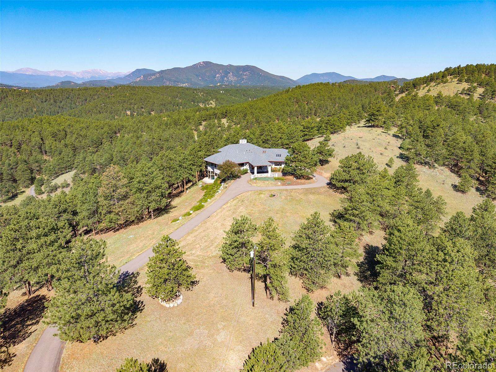 13.5 Acres of Land with Home for Sale in Evergreen, Colorado